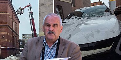 Lód z dachu banku uszkodził auto. Inspektor kontroluje